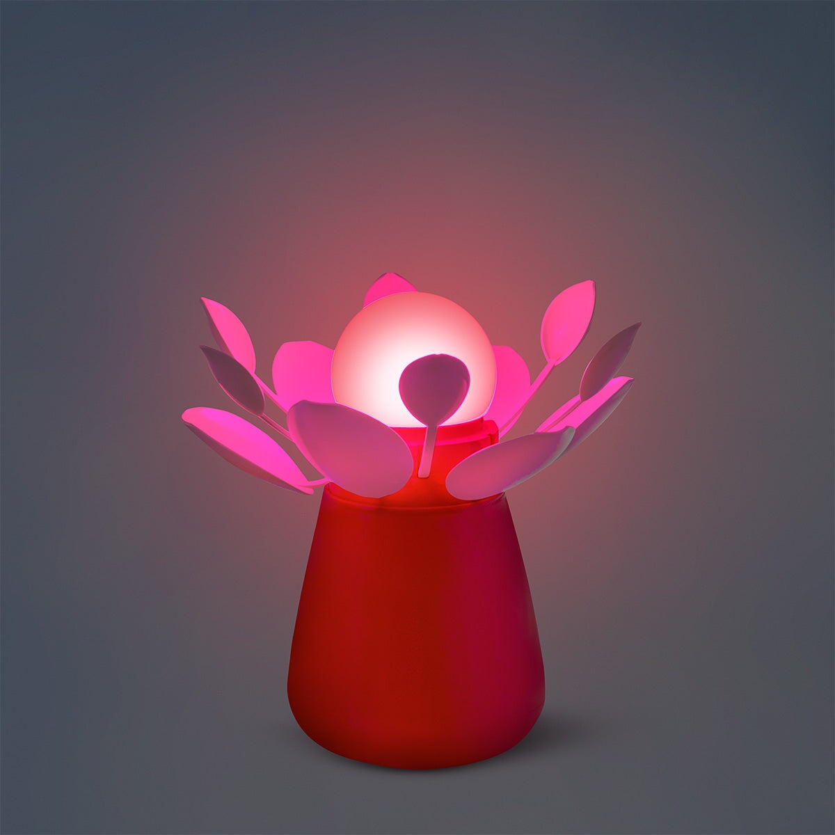 Glowing red flower lamp that moves